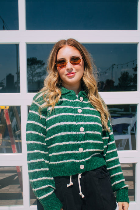 Green button up sweater